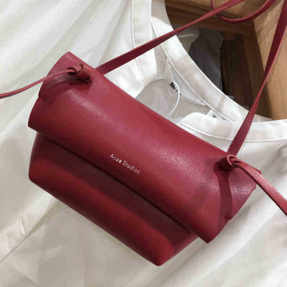 

22 Designer Bags Acne Ins Net Red Minimalist Retros Hong Kong Style Package. One Shoulder Mini Dumplings Studio Bag Foreign style handbag, Rock blue - m