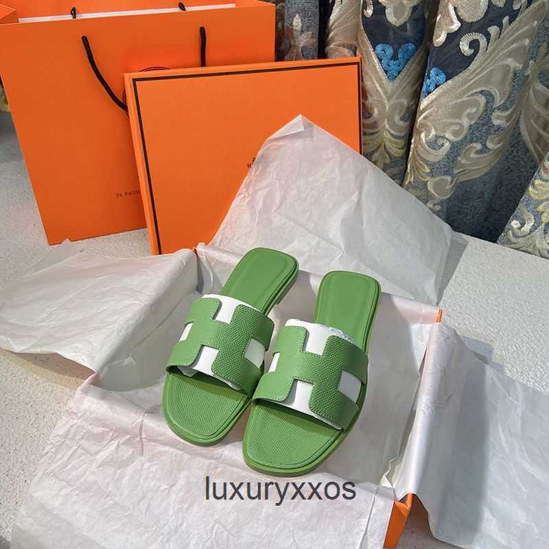 

Women Shoe Leather Slide Beach Flat 2023 High Orans Designer h Sandal Slippers Slotted Trawl Fashion Outwardly Wearing Beach Sandals H1at