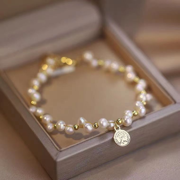 

Natural Hotan Jade Bracelet with Qingshui Rabbit Honey Wax Spacer Accessories Design Elegant Style for Boys and Girls