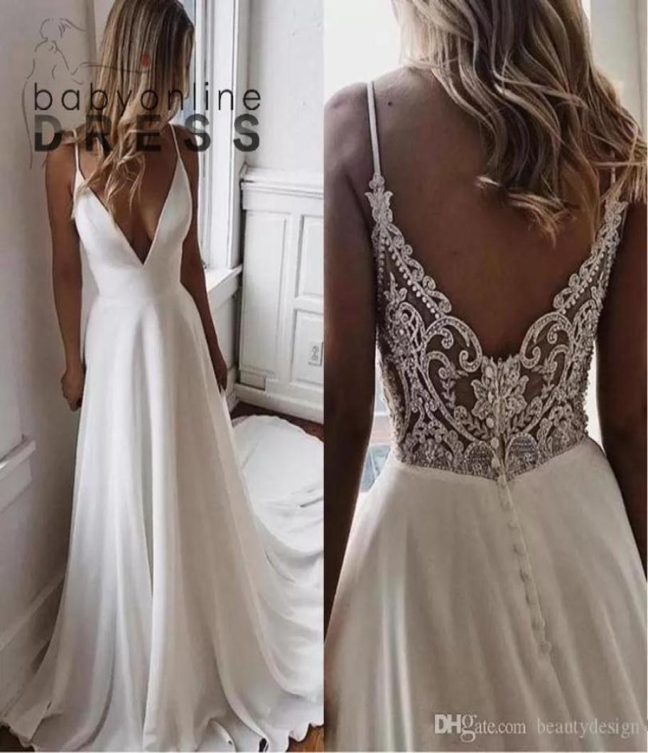 

Sexy African Deep V Neck A Line Spaghetti Strap Wedding Dresses Plus Size Crystal Beaded Lace Appliqued Bridal Gowns With Zipper B6269435, Ivory