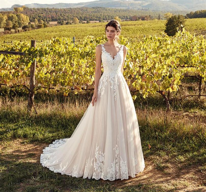 

VNeck Lace Appliques ALine Wedding Dresses 2020 Sexy Backless Bridal Gowns Slim Formal Vintage Vestidos De Marriage Middle East6428295, Pink