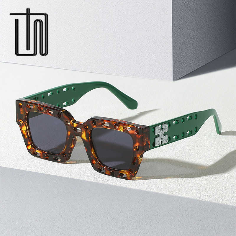 

Wholesale of sunglasses New Modern Square INS Style Hollow out Versatile Street Photography Sunglasses for Men and Women