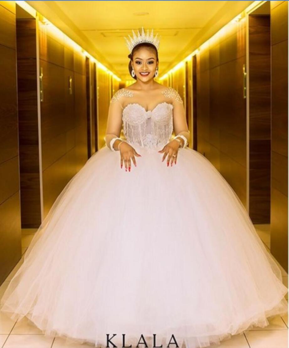 

African Wedding Dresses Sheer Jewel Neck Luxury Beaded Tassel Ball Gown Long Sleeve Bridal Gowns Sexy Back Plus Size Wedding Dress4056565, Custom made from color chart