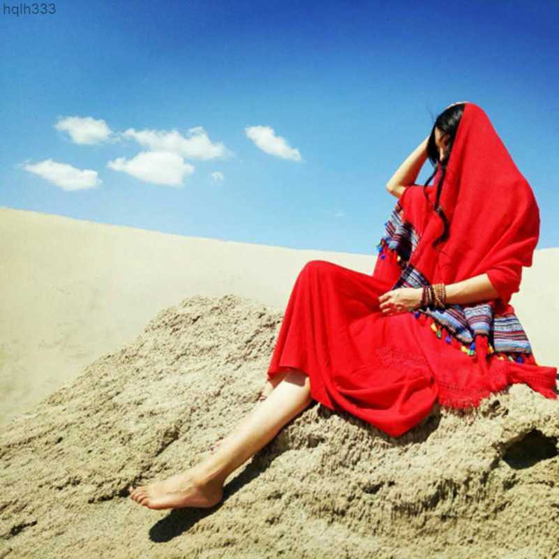 

Ethnic style red travel cape in northwest China Women's Qinghai Lake grassland cotton and linen scarves Photograph Xinjiang Tibet scarves