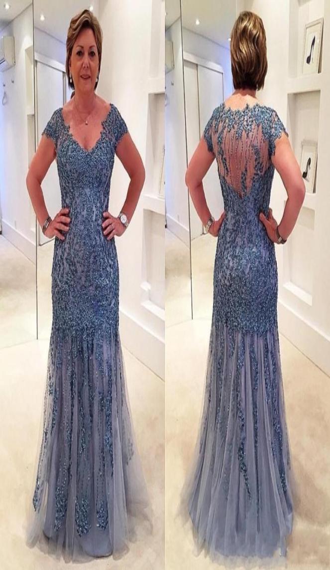 

2021 Sexy Luxury Mother Of The Bride Dresses V Neck Cap Sleeves Illusion Mermaid Lace Applique Crystal Beaded Floor Length Plus Si4729665