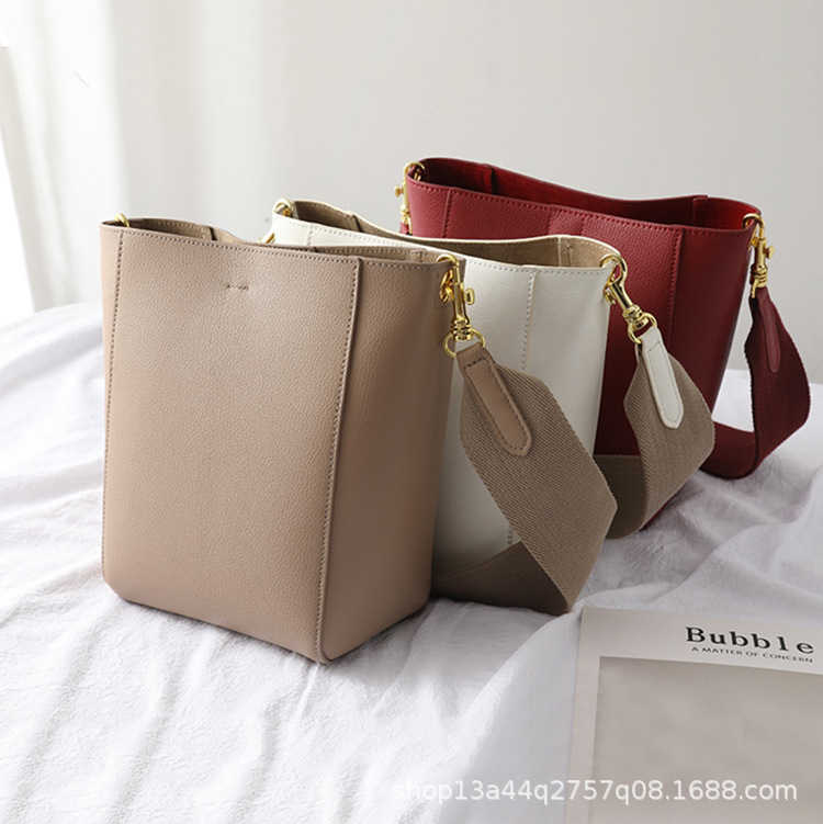 

Baobao Women's Crossbody Bag Wide Shoulder Strap Bucket Bag New Genuine Leather Women's Bag Simple and Versatile One Shoulder Large Bag, Milk tea color - (cowhide)