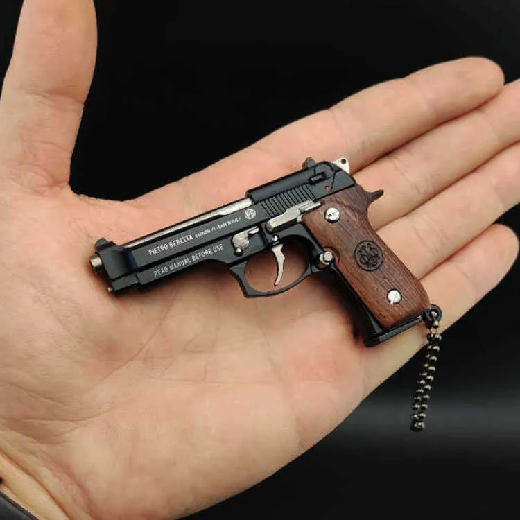Gun Toys Portable Gun Model Keychain G17 Pistol Shape Keychain Mini Metal PUBG M29F Desert Eagle Shell Ejection Free Assembly Best Quality-image-1048876358