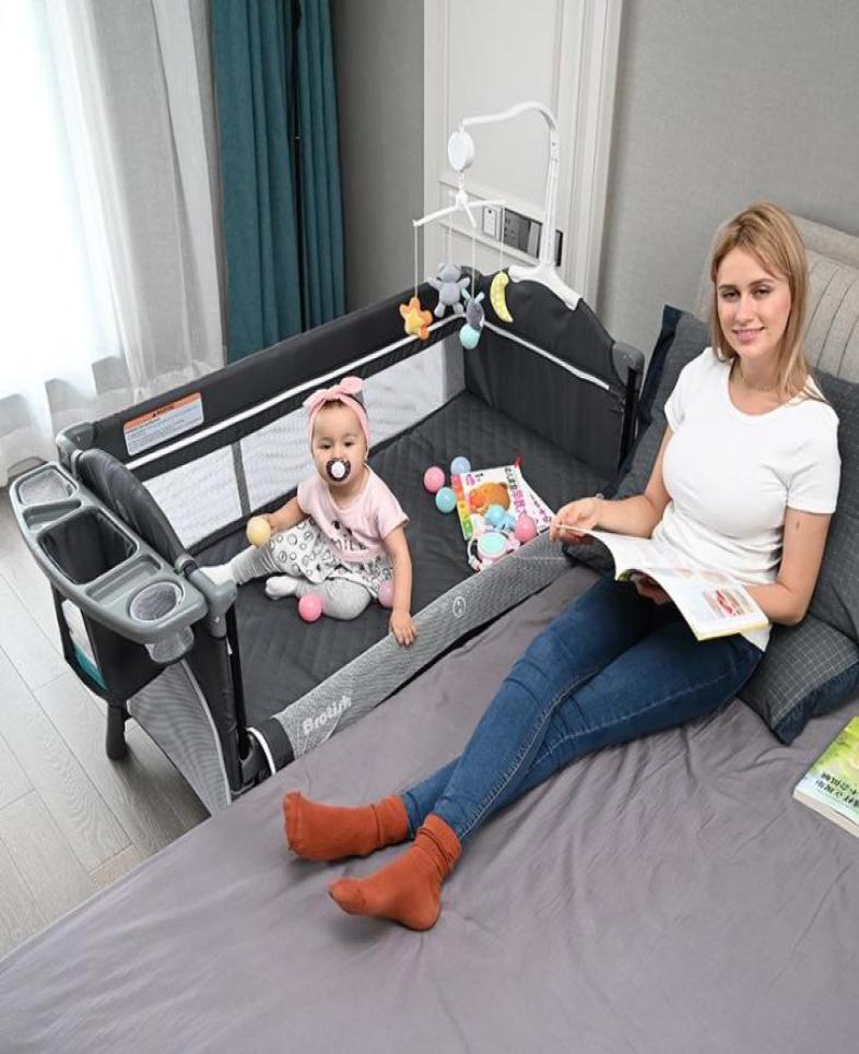 

Multifunctional Foldable Crib Splicing Large Bed Removable Baby Bedside Cradle With Diaper Table And Toy Stand Cribs3815419