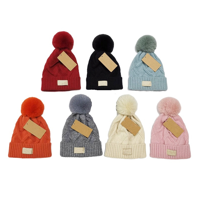 Fashion Knitted Winter Beanie For Woman Designer Flanging Solid Color Beanies Warm Winter Crossed Pom Pom Hat-image-907230305