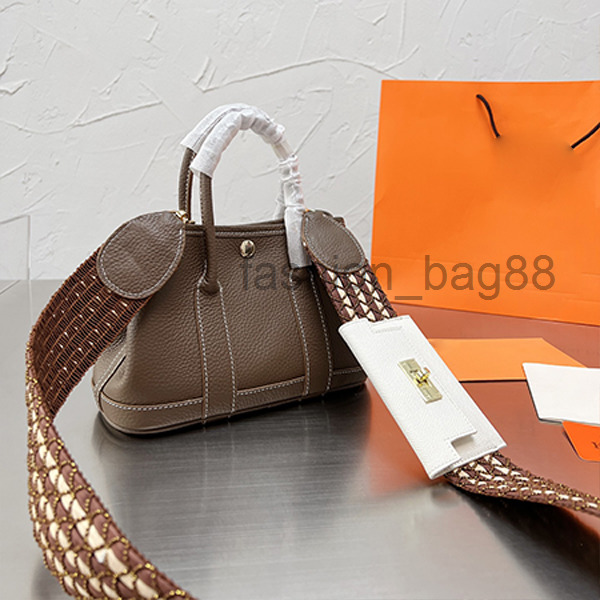 

Top quality handbags garden bag New layer cowhide tote bags litchi pattern Wide shoulder strap versatile Messenger portable women's Bag Fashion h 2022, 88