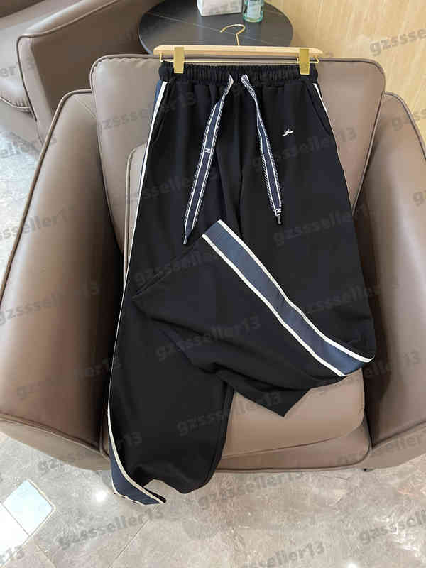 

Designer Womens Pants Dr Letter Logo Striped Webbing Loose Casual Pants Fashion Brand Lace-up Waist High Quality Sweatpants Luxury Women Clothing 0912