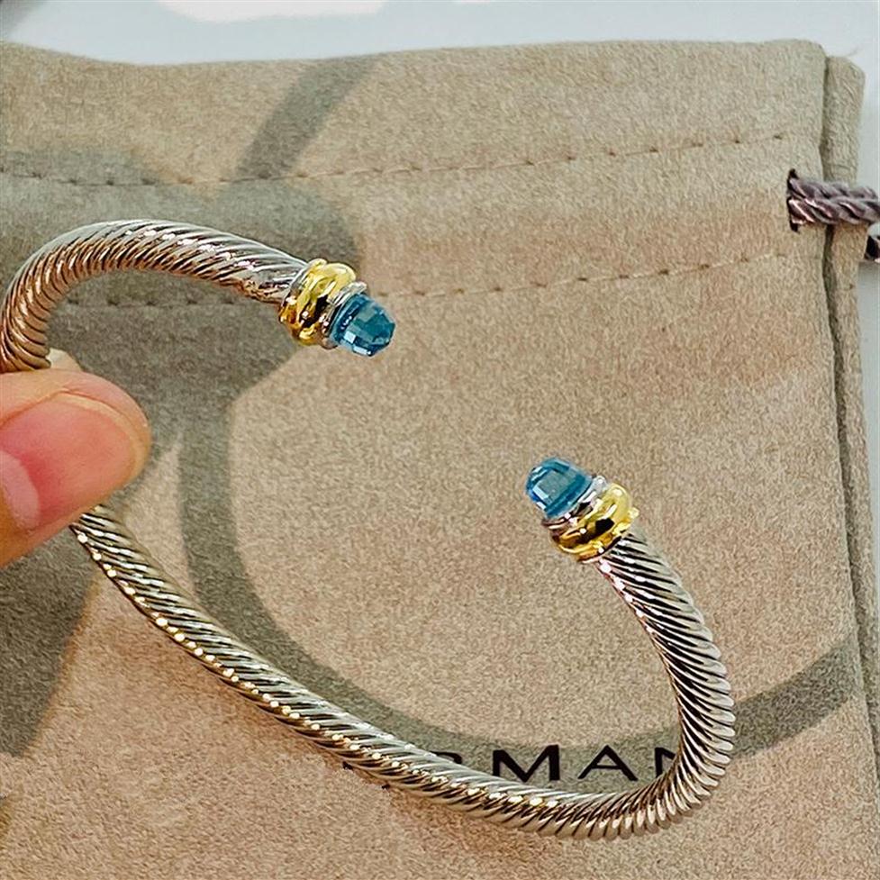

Bangle Cable Classic Collection Bracelet With Blue Topaz And Black Onyx 18K Yellow Gold1410758315O