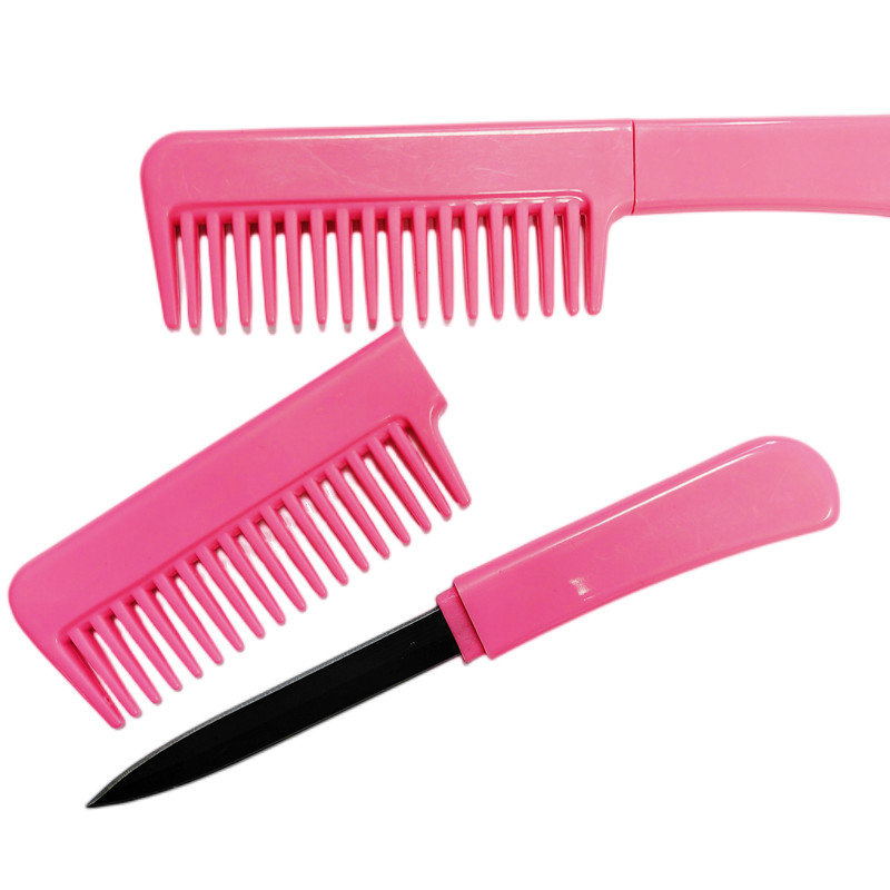 

Fashion Accessories Pink hair comb with metal knife self defense tools on self France