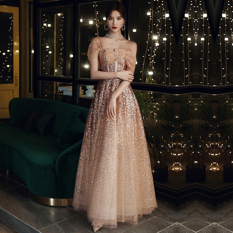 2023 Robes de soirée à paillettes Occasion formelle Porter des appliques d'or Perles robes de bal