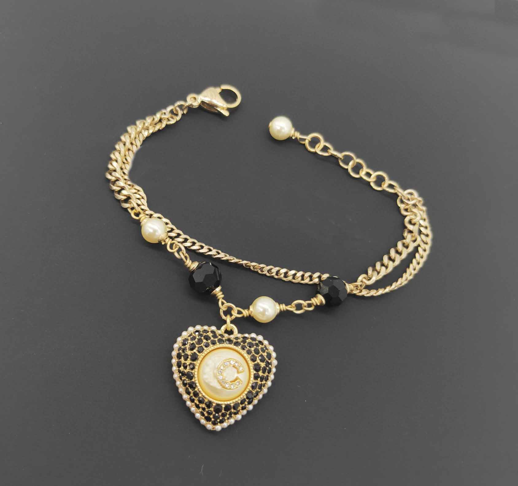 

2022 Top quality Charm heart pendant bradelet with diamond in black and white double chain have box stamp PS7153A