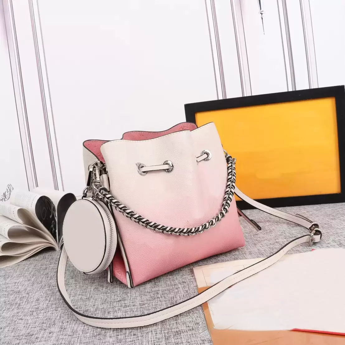 

Crossbody Gradient colour Mahina leather bella bucket bag with removable coin purse women Hollow Out perforated pattern Drawstring Bags attached wallet, Blue