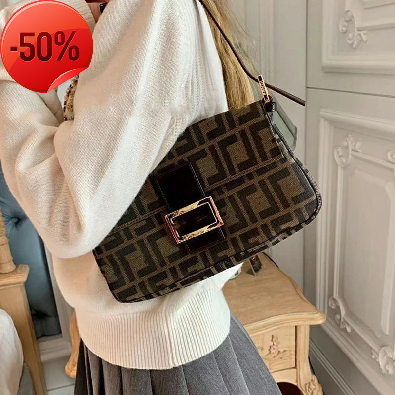 

Designer Bags Evening clutches Bag Vintage Middle Ancient Flower Staff Bag Ff Underarm Net Red Mintote purses ladies handbags Factory wholesale Surprise price, Old flower stick bag