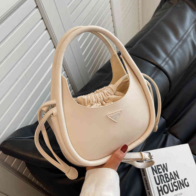 

New bag women's 2022 new version simple fashion popular casual hand-held one shoulder armpit bag, Creamy-white