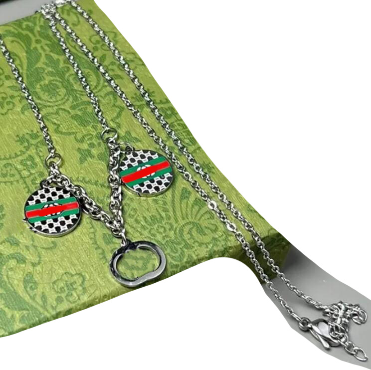 

Pendant Necklaces designer jewelry luxury heart for mens womens bijoux Ancient home titanium steel drop glue two-color sweater chain pendant lovers three brand