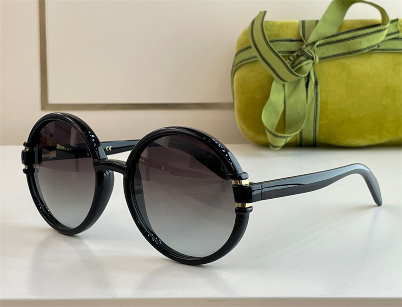 

Fashion designer 1067 sunglasses for women elegant round shape acetate sun glasses summer outdoor simple and versatile style Anti-Ultraviolet come with box