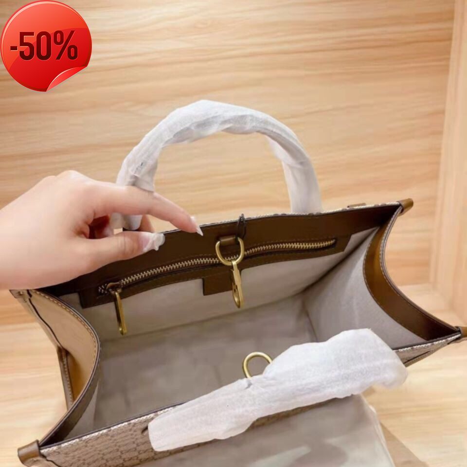 

Designer Bags 2022 New Kuqi Leather Tote Shopping Men's and Women's One Shoulder Msenger Net Red Same Tote purses ladies handbags Factory wholesale, Sky blue