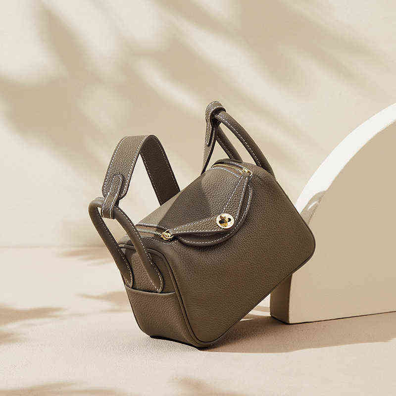 

Bag herme designer lindi bags female 2022 new litchi grain cowhide Lindi pillow bag fashion wide shoulder belt Single Shoulder Messenger, Elephant gray