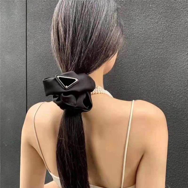 

Designer Triangle Pony Tails Holder Letter Large Intestine Ring Pure Color Silk Hair Band Women Satin Hair Ropes Wholesale