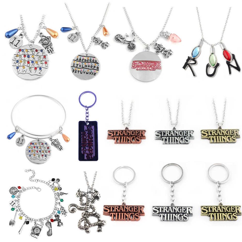 

RJ 20Pcs Lot Stranger Things Alphabet Light Wall Monster 11 Letter Snake Pendant Lady Girl Necklaces Wholes Movie Jewelry277q