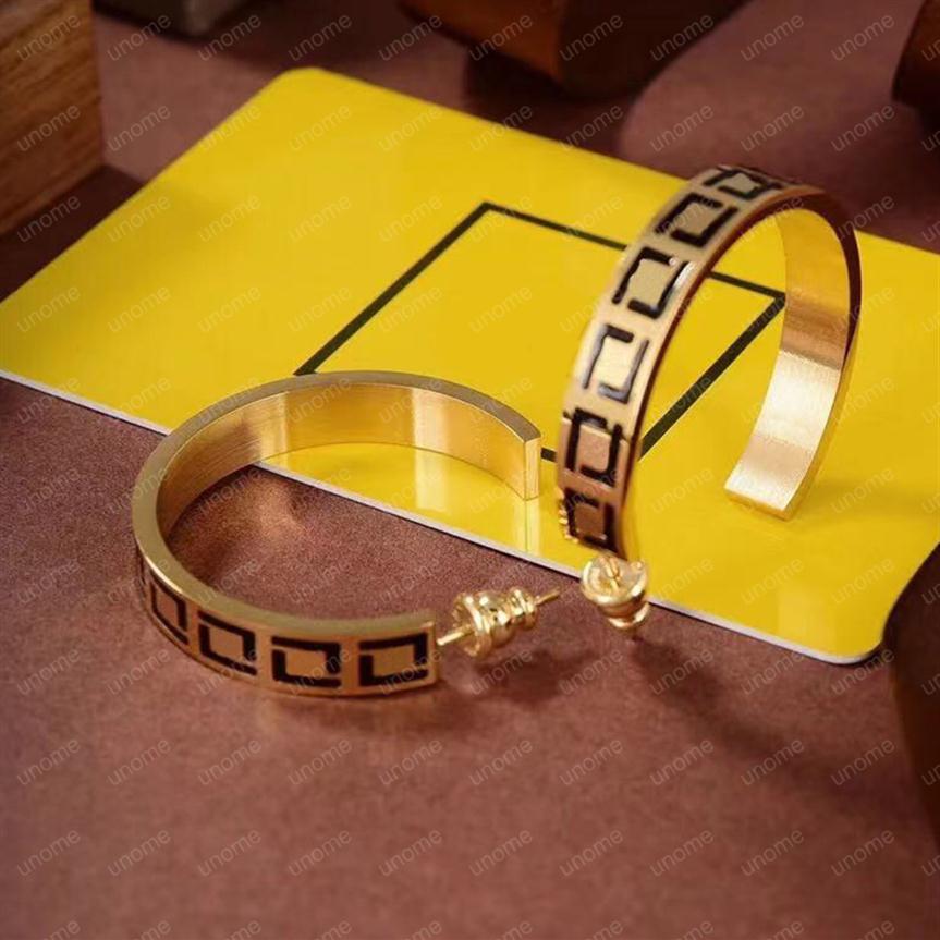 

2022 Designer Gold Stud Earrings For Women Green Pendant Hoop Earring Luxurys Designers Unome F Letter Stud Earrings D2201261Z2185241w