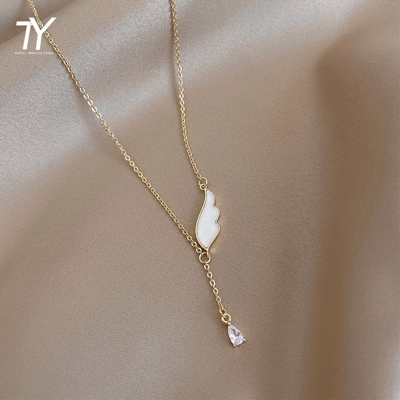 Design Sens Blanc Aile Pendentif En Cristal Collier Court Pour Femme De Luxe Coréen Bijoux De Mode Party Girl Sexy Clavicule Chaîne