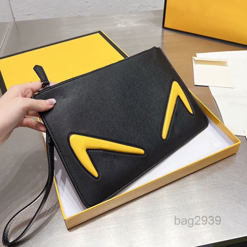 

Briefcases Men Clutch Bag Women Handbags Purse Genuine Leather Zipper Closure Inside Fashion Letters Classic Hand Bags 26cmMulti Pochette