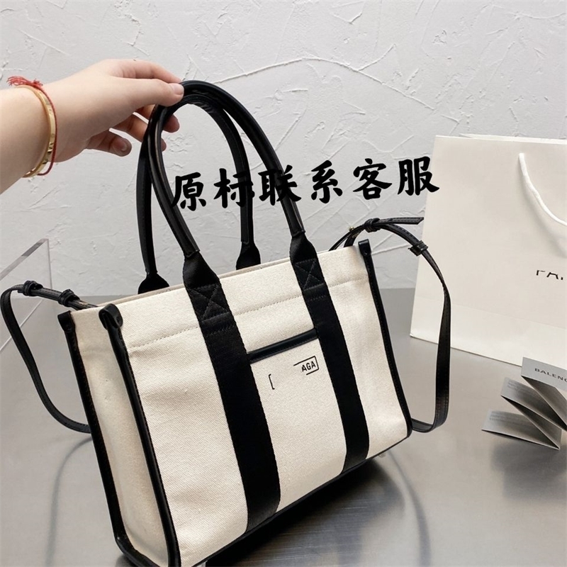 

Tote Bags Designer Balencigas Handbags New b Paris Black and White Letter Canvas Handbag Large Capacity Single Shoulder Diagonal Straddle Tote Bag for Men and Women