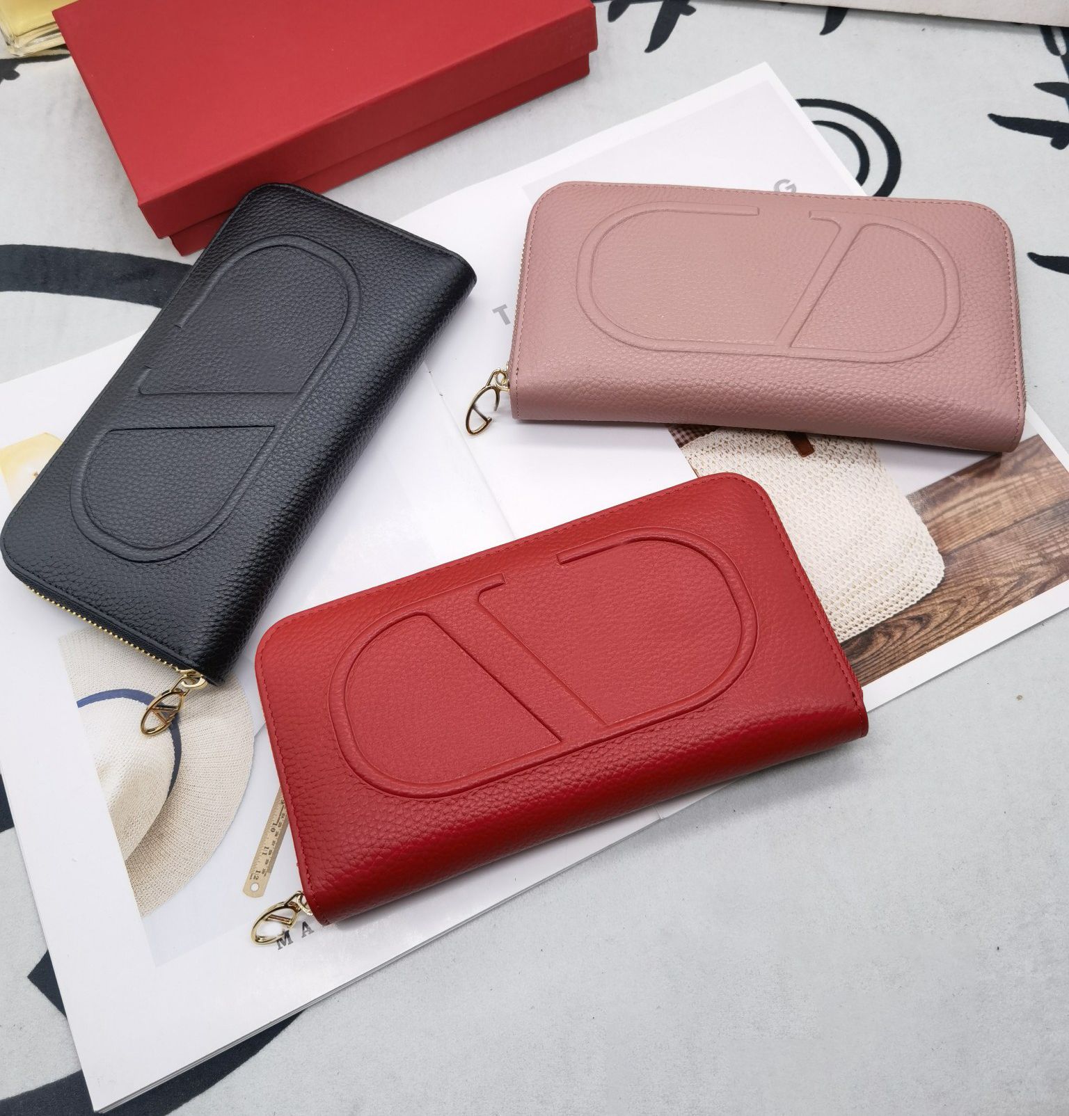 Portefeuille de créateurs de mode Femmes Portefeuilles en cuir véritable Style italien Porte-monnaie Sacs à main Paris Porte-carte Embrayage avec