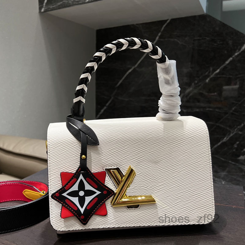 

Evening Bags ss Vintage Twist Denim Water Ripple Bag Chain Shoulder Crossbody Bags Spin Lock Women Fashion Messenger Designer Handbags Lady Phone Purse