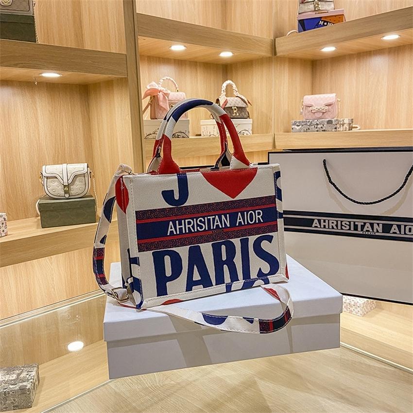 2022 Tote Sac Canvas pour femmes à l'étranger Summer Summer Fashion 100 Capacité Portable Mands Portable