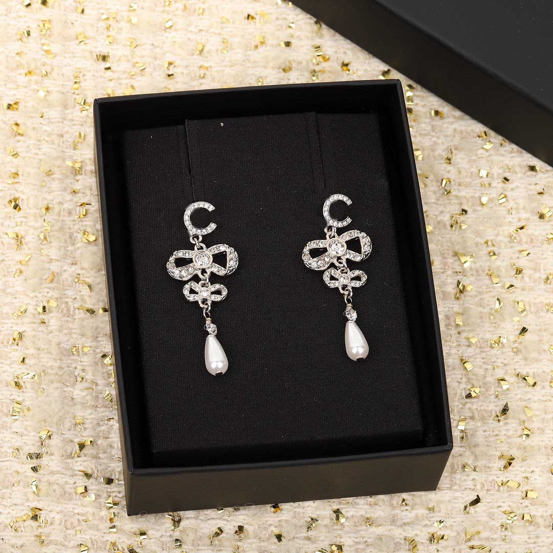 Luxury quality Charm drop earring in platinum knot shape have box stamp PS4440