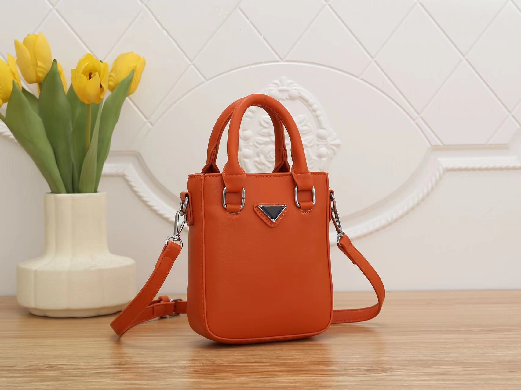 

New fashion one shoulder oblique body simple woman bag inverted triangle solid color comfortable portable mini Toth bucket bag, Dust bag