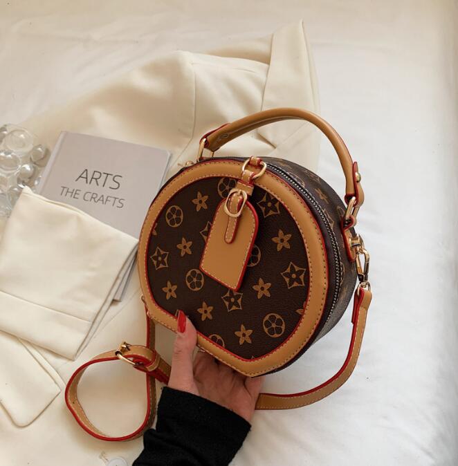 

women bag 2023 New Designer Handbags round printing slant cross bags portable for women