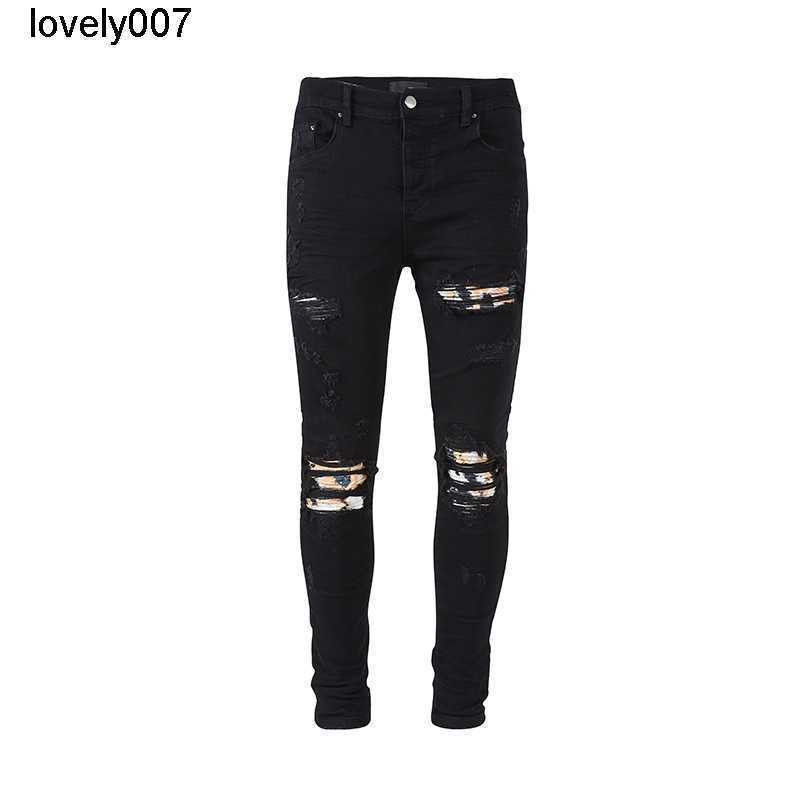 

Dsigner Men's Jeans amirs new Brand Black Cattle Washing Water Broken Hole Old Cashew Flower Color Slim Fit Jeans Men's