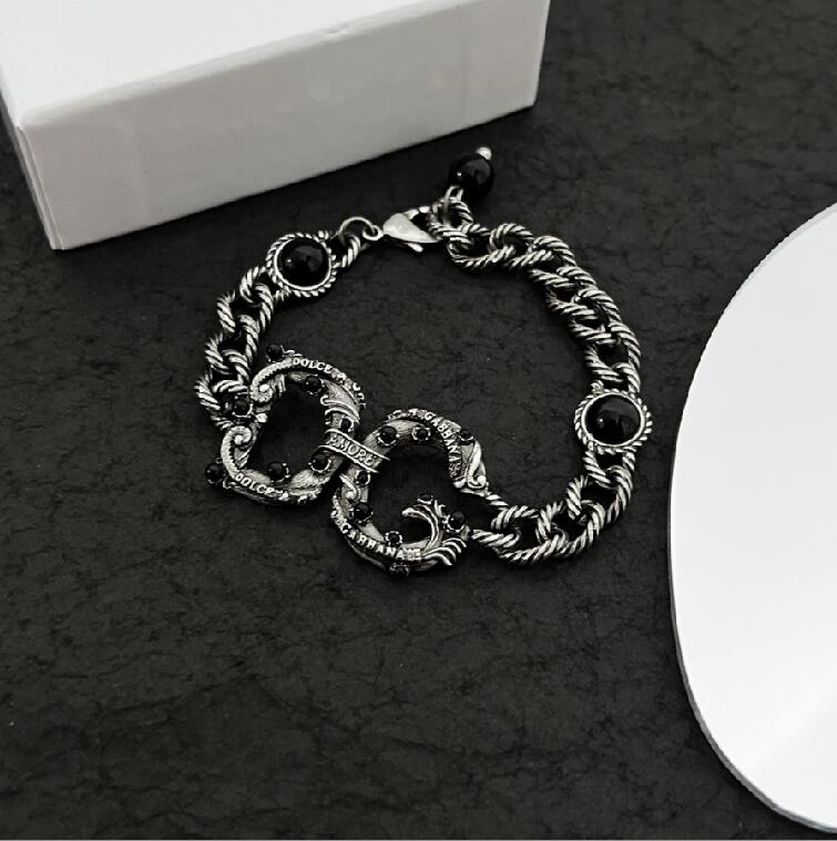Mode nouveau collier rétro noir conçu Bracelets boucle d'oreille créoles G Lettres brillant non-fading 18K plaqué or femmes collier Designer Bijo