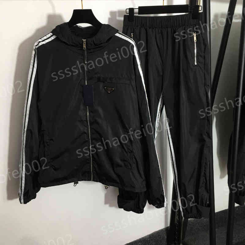 

Women Two Piece Pants PD Luxurious Designer Tracksuits Hooded Trench Coat Zip Trench Coat Jacket Trousers 2 Piece Sets Designers Female Apparel 0912, 11