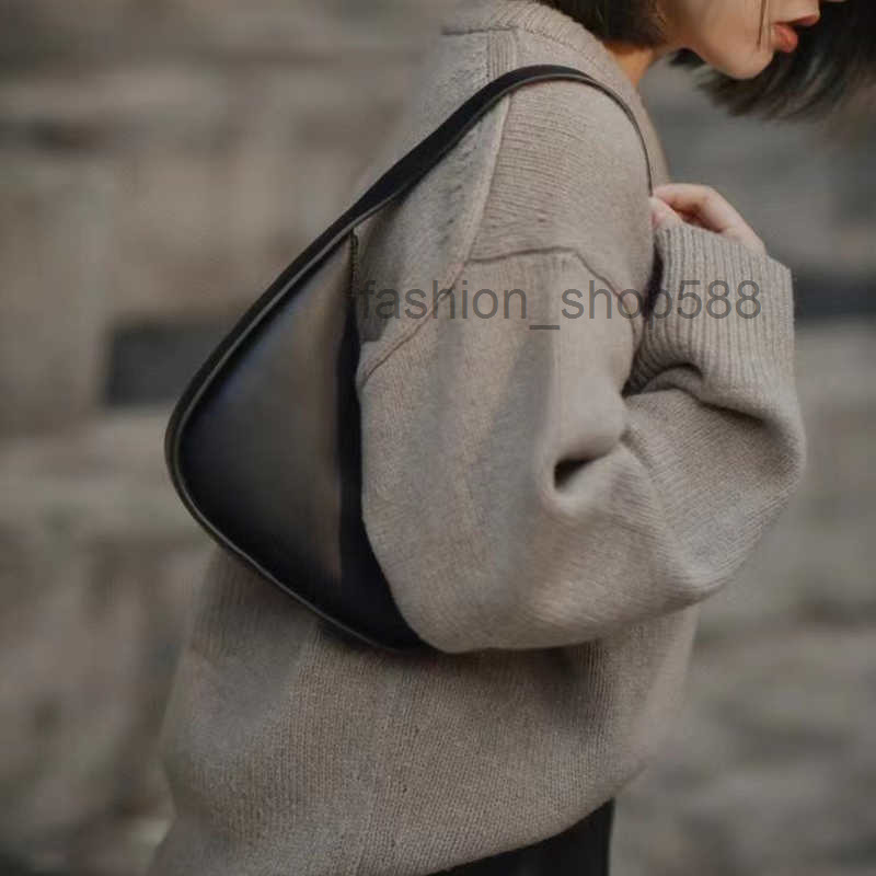 

Women Luxurys Designers Bags High end the row leather shoulder bag women's armpit irregular fashion portable crescent simple hand Crossbody, Black