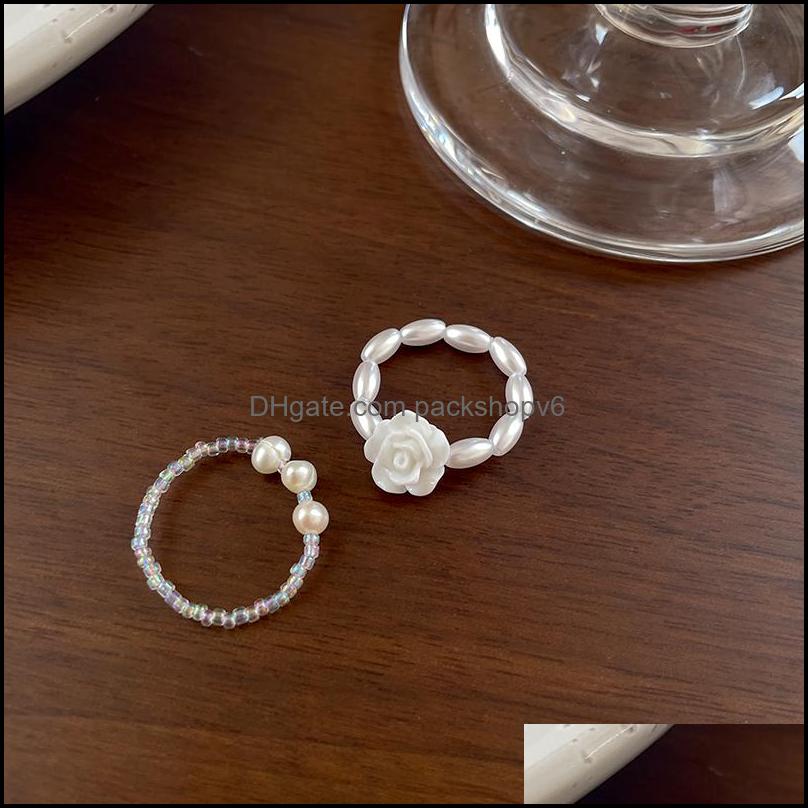 Boucles d'oreilles à charme Niche Design Original Rose Flower Anneau Imitation Perle Elastic Cord Alloy Creative 135 Drop livraison 2021 JE Packs