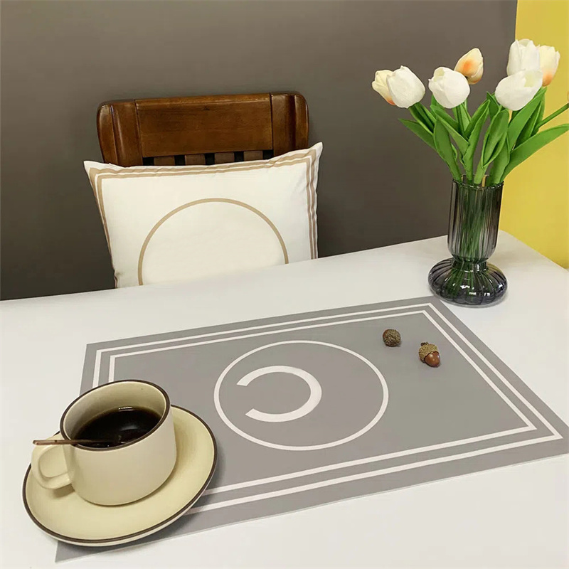 

2022 Luxury Designer Restaurant Mat Fashion PU Letter Table Mats Waterproof And Oilproof Bowl Mat Decoration Premium Western Placemat