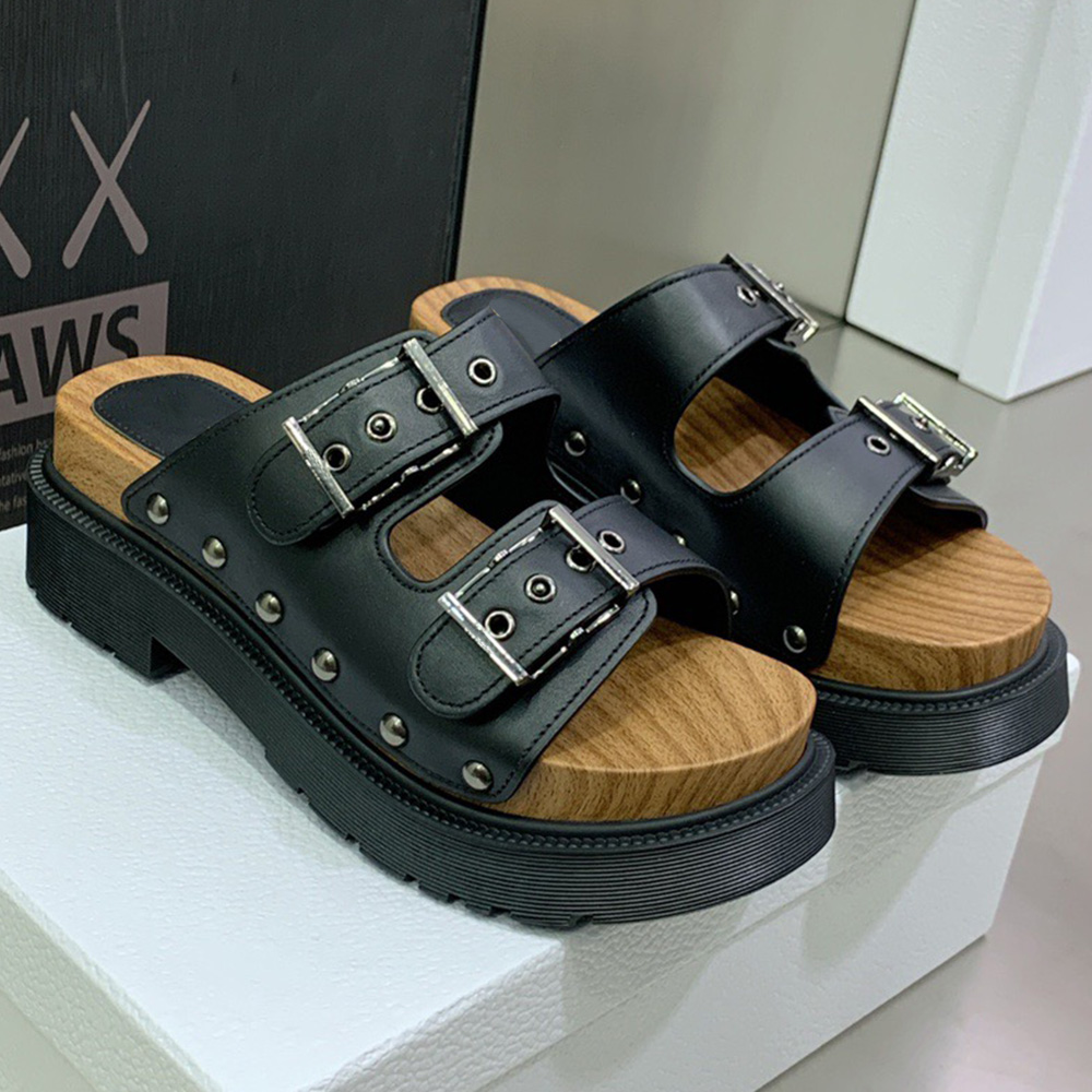 

QUAKE STRAP SANDAL makes its mark with the brands couture wood and black rubber hybrid sole this shoe will bring a stylish touch to any look this season sandals, Shipping supplement