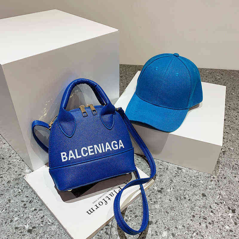 65% de rabais sur la boutique d'usine en ligne 2022 Nouveau sac de couleurs de bonbons de la mode solide Sac simple chapeau correspondant à la mo