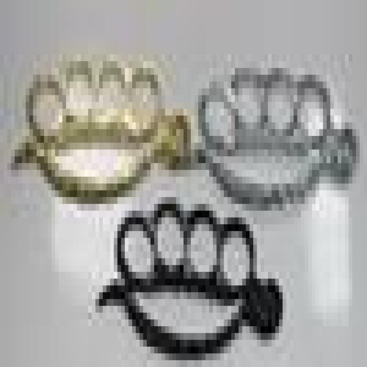 

New knuckles duster Iron four finger buckle Big ghost head fist buckle outd