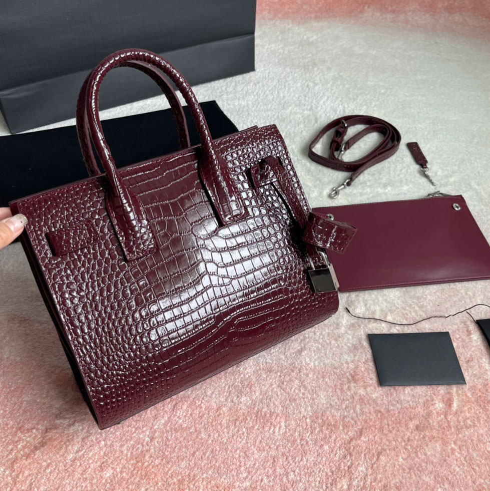 

Yysls handbags bags SAC DE JOUR NANO IN EMBOSSED CROCODILE SHINY LEATHER designer luxury tubular handles accordion sides compression straps tabs removable YKWK, Dust bag