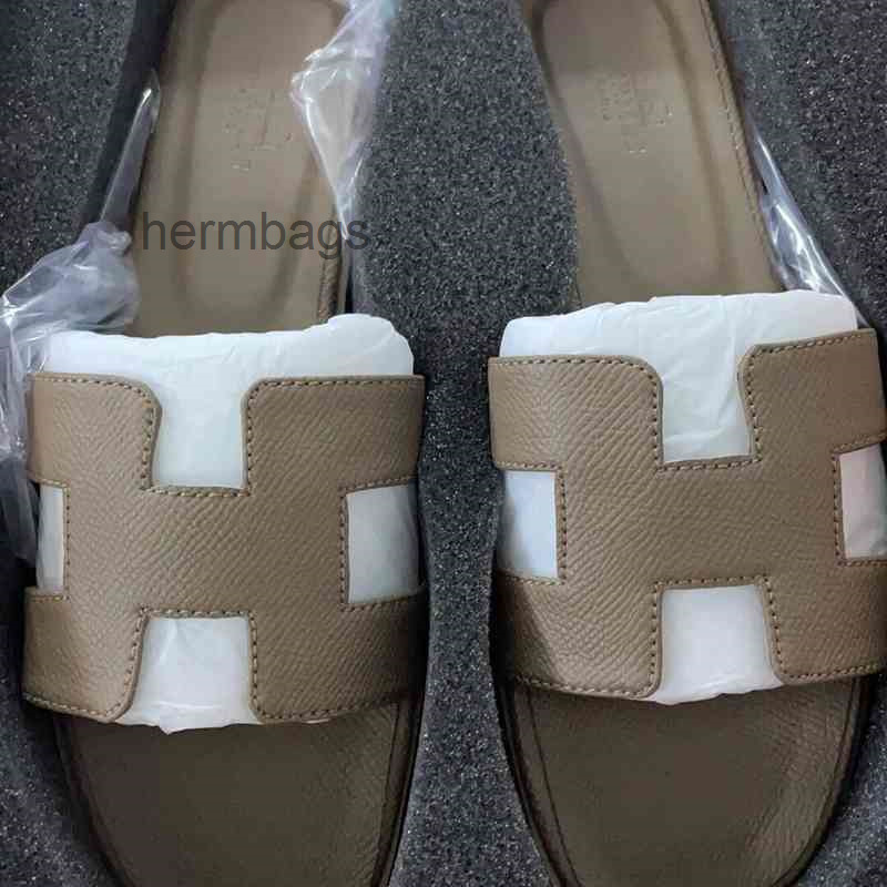 Slippers Herme Designer Femmes Oran Sandals Slippers Slippers Hermse Sandal Oasis H Women039S Summer Cuir polyvalent One Line Tourism W