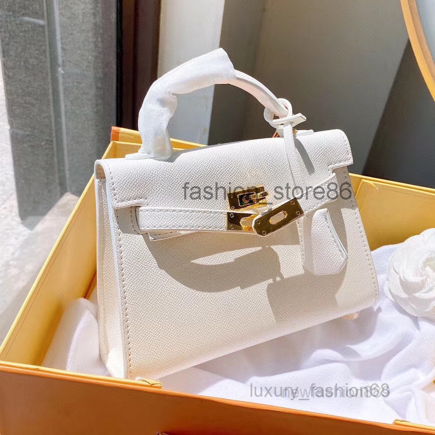 

Designer Evening Bags fashion tote bag New Fashion Mini Womens Bag Real Leather Portable Cowhide Second Generation Kellies pure colour 5a high quality, 20